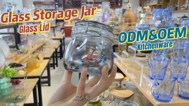 Glass storage jar with metal clip for kitchenware collection