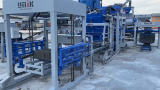 Cement concrete brick making machine