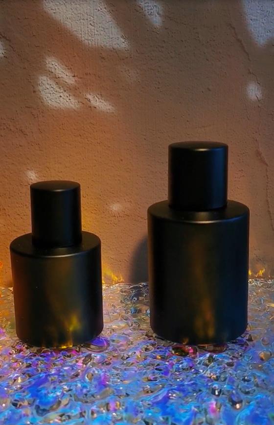 black flat shoulder perfume bottle