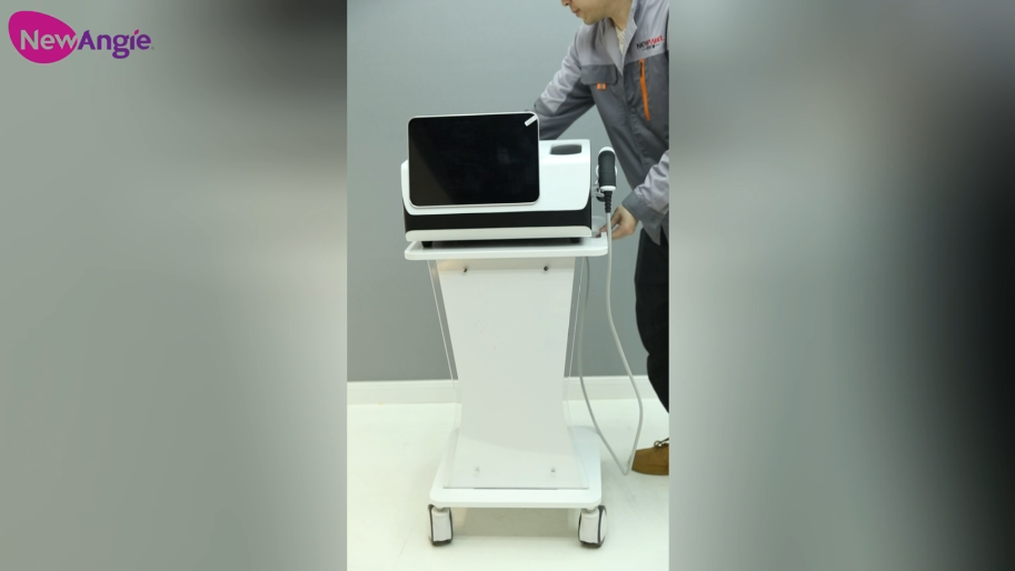 Newangie shock wave therapy machine - treats tissue damage such as muscles, ligaments and bones