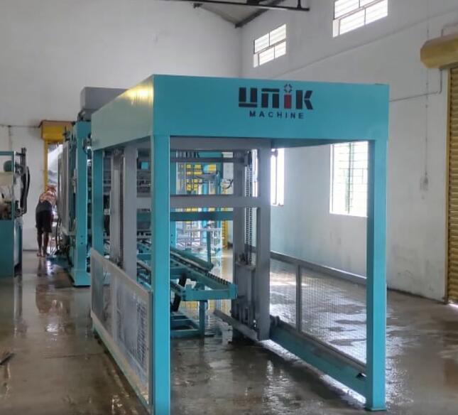 Concrete block making machine running in india