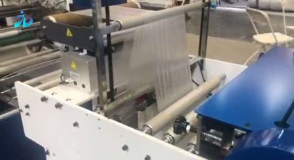 Automatic vegetable flat bag on roll making machine with core