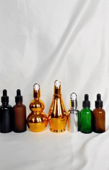 essential oil bottles with different crafts